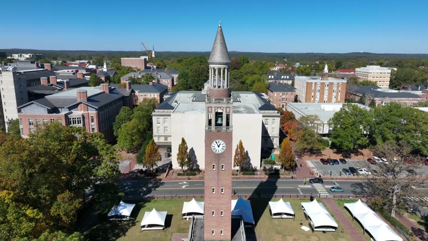 UNC Chapel Hill Morehead-Patterson Bell Tower. Aerial orbit of University of North Carolina campus in autumn.