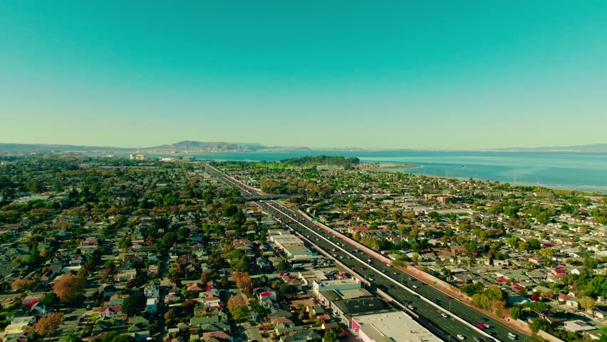 San Mateo, CA 94401 - US 101.Cinematic Aerial Suburbs San Francisco, California, USA.San Bruno Mountain State County Park in distance. Royalty-Free Stock Footage #1111889937