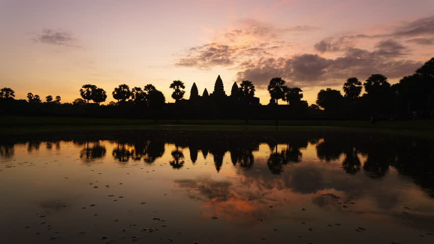 Timelapse of sunrise reflection at Angkor Wat archaeological site in Cambodia Royalty-Free Stock Footage #1111890861