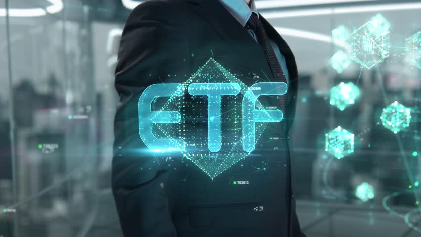 ETF- businessman working with virtual reality at office.