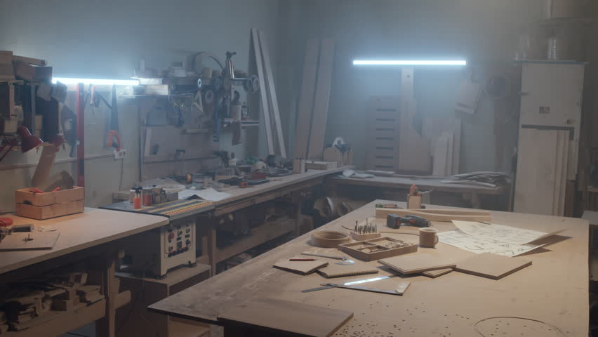 Interior of carpenters workshop filled with special equipment and tools for working with wood | Shutterstock HD Video #1111898807