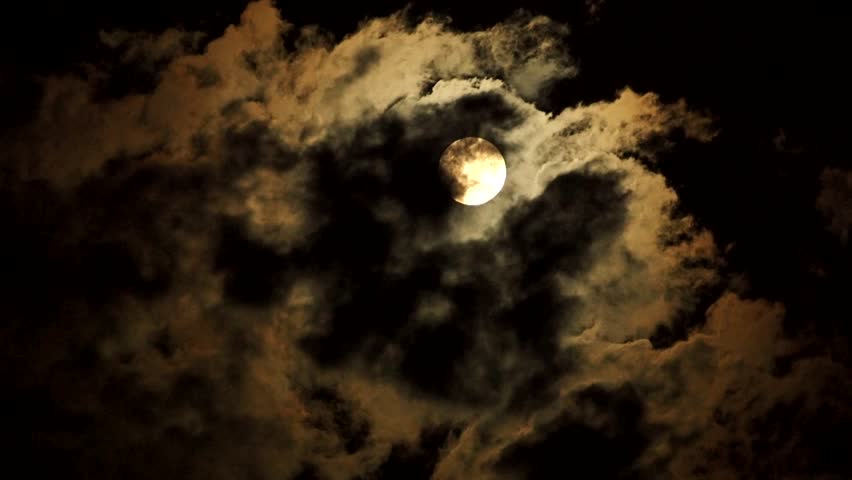 Full moon with dark cloud in the night, countryside Chiangmai province  Thailand