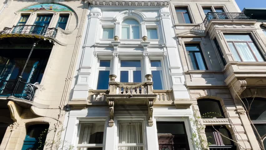 Grand architecture in historical part of the city of Antwerp, Belgium on a sunny day, slow motion video