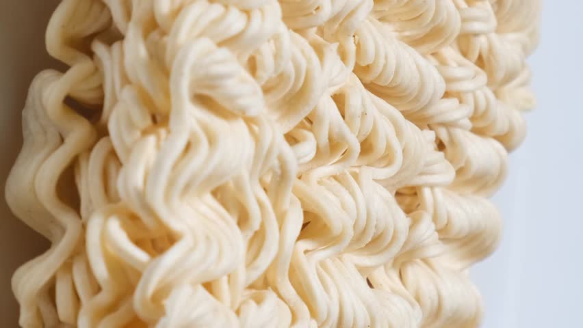 Instant noodles rotate in a circle. Vertical video | Shutterstock HD Video #1111905197