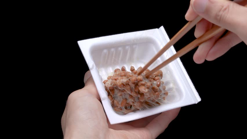 Video of mixing NATTO well on a black background.
4K 120fps edited to 30fps | Shutterstock HD Video #1111905407