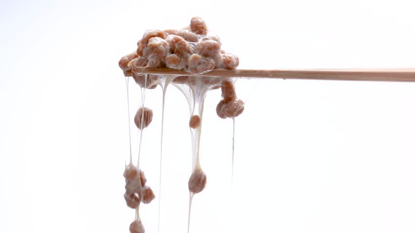 4K slow motion video of natto falling off chopsticks.
4K 120fps edited to 30fps.
White background. | Shutterstock HD Video #1111905429