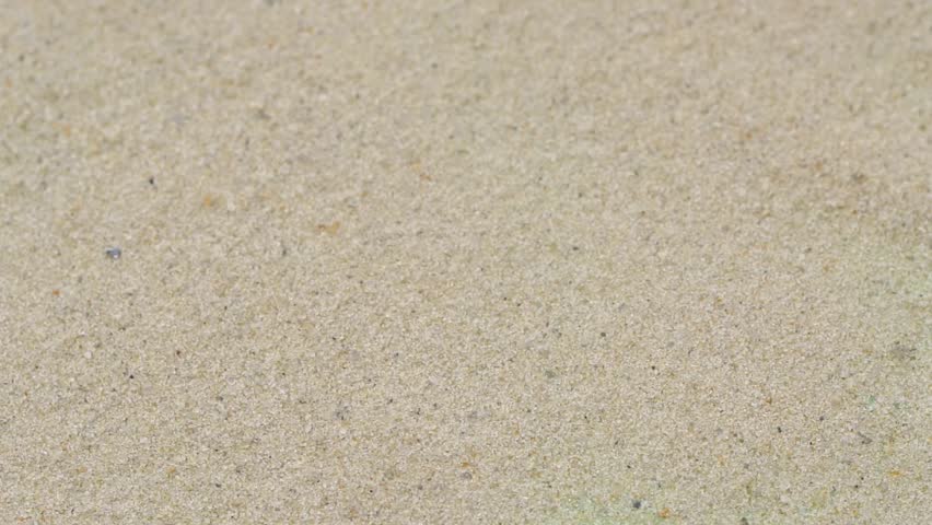 Closeup abstract sand transition blowing over green screen chroma key background | Shutterstock HD Video #1111909645