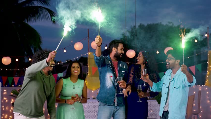 Group of indian young friends dancing and shouting while celebrating 2024 new year party - concept of nightlife, excitement and millennial friendship gathering Royalty-Free Stock Footage #1111910261
