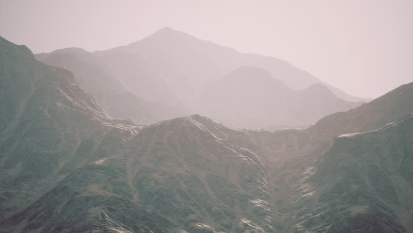 View of the Afghan mountains in fog | Shutterstock HD Video #1111910851