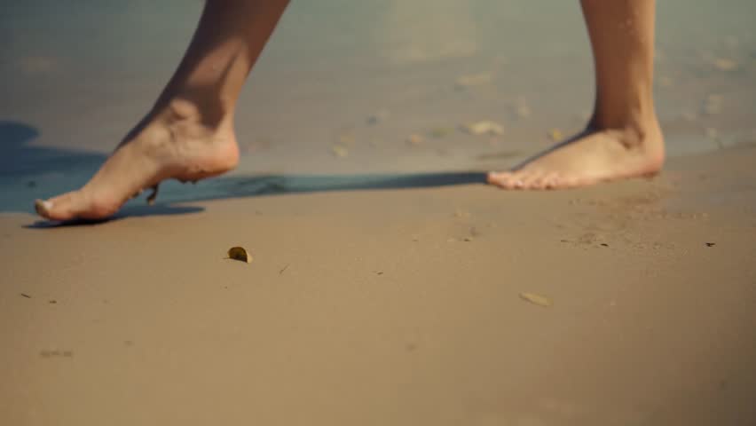 Woman legs walking on sand beach | Shutterstock HD Video #1111916145