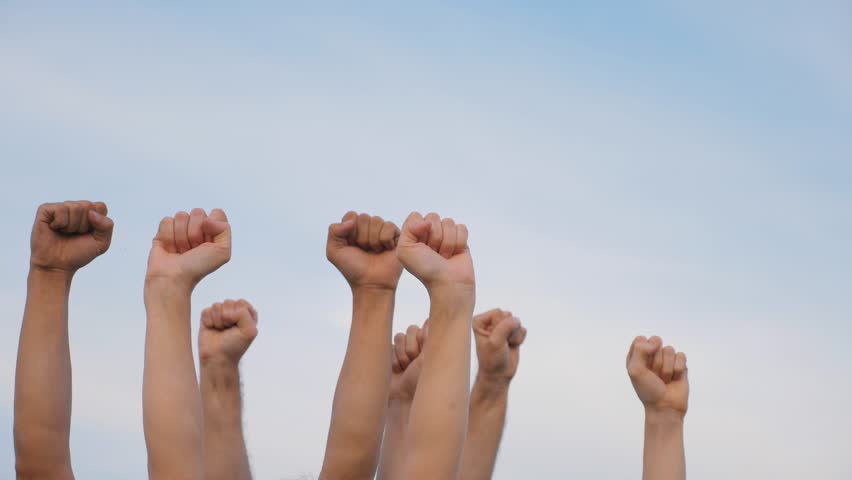 Teamwork. A group of people against the sky raises their hands up. The concept of voluntary voting, expression of consent, support for democracy. | Shutterstock HD Video #1111922543