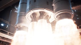 Space Exploration Rocket Launch at Night. Close-up shot of Rocket Engine Ignition. Powerful and Hot Flames Burst out of the Nozzle after Initial Impulse. Vertival Takeoff of Large Rocket with Boosters - Powered by Shutterstock - Get 15% off with code: PIKWIZARD15