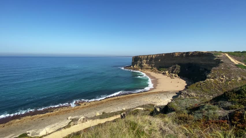 Amazing portuguese beach on a cliff | Shutterstock HD Video #1111927077