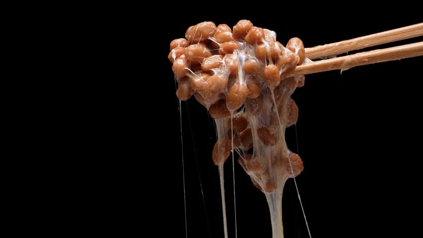 4K slow motion video of natto falling off chopsticks.
4K 120fps edited to 30fps. | Shutterstock HD Video #1111929595