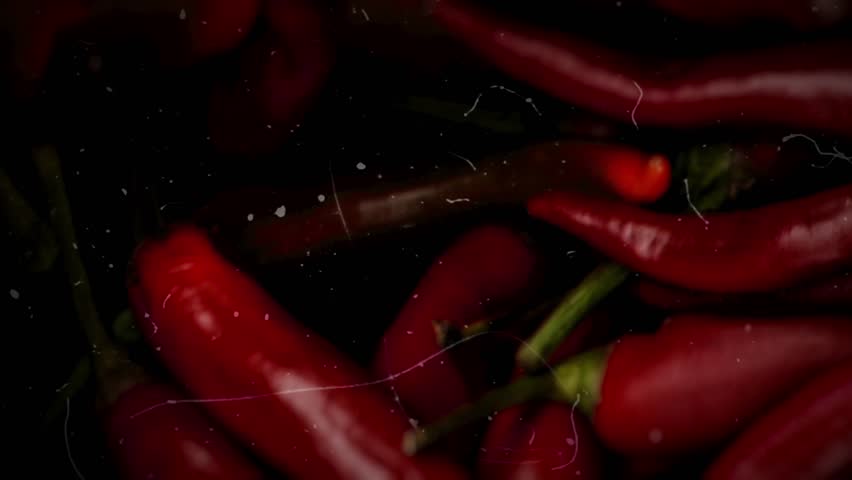 Stop motion hot chilly peppers background. A lot of of  peppers in stop motion, Top View Closeup Background | Shutterstock HD Video #1111935933