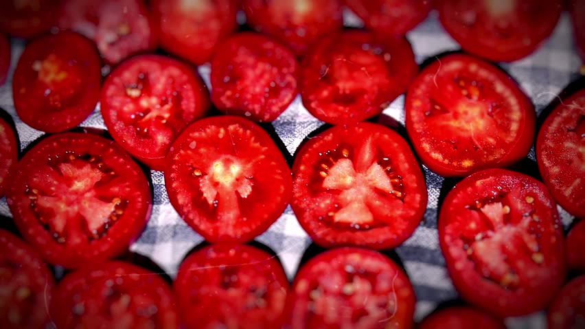 Stop motion animation pattern of  cut ripe tomatoes   | Shutterstock HD Video #1111935941
