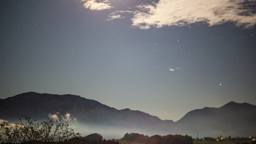 Starry night over the Austrian alps - cloudscape time lapse