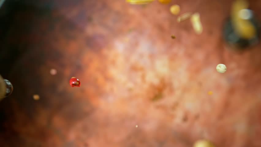 Super Slow Motion Shot of Flying and Rotating Various Spices. Filmed on High Speed Cinema Camera, 1000fps.