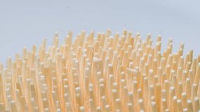 Macro video of a toothpick on a white background. Wooden sticks for cleaning teeth - Powered by Shutterstock - Get 15% off with code: PIKWIZARD15