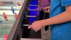 Table football football mini football with sticks and rods. Teenager child and board game - Powered by Shutterstock - Get 15% off with code: PIKWIZARD15