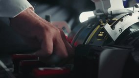 Airplane Pilot Preparing Control Panel of Dark Cockpit to Flight Close-Up. Hand of Professional Man Switches Plane Lever to Fly Off Airport Closeup. Ready Aviator Studying Technology of Aircraft Cabin - Powered by Shutterstock - Get 15% off with code: PIKWIZARD15