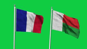 France and Madagascar Flag waving in sky. High detailed waving flag of France and Madagascar. Flag of France and Madagascar. 3D Render. Waving in sky. Green background