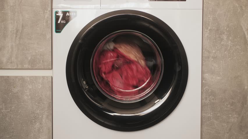 wash machine, Clothes washing machine in laundry room interior. Royalty-Free Stock Footage #1111969893