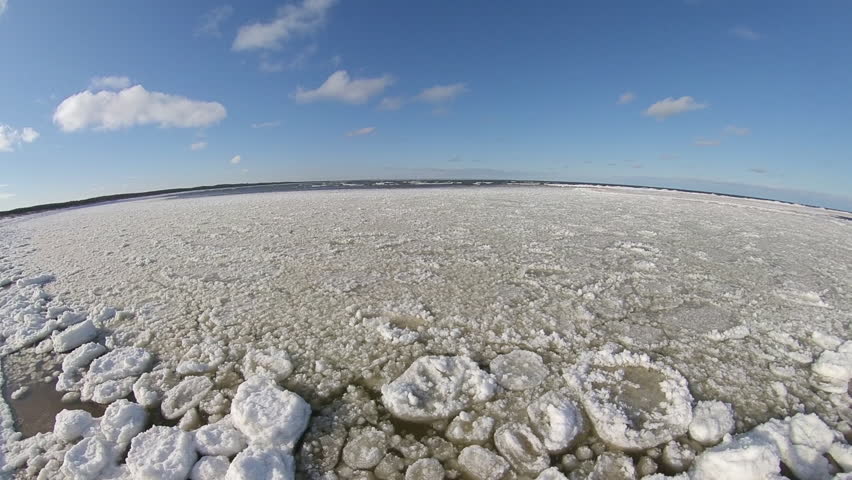 Ice floes and Icebergs on Frozen Baltic Sea in Poland on Sunny Day | Shutterstock HD Video #1111972725