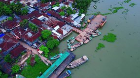 River Ghat in Rural Area,Ferry Ghat in Riverside Village Drone view,4K Aerial footage    