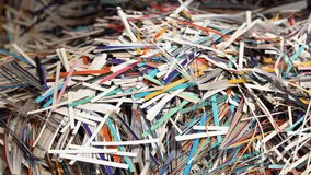Pile of shredded paper. Document shredding, identity theft and fraud concept - Powered by Shutterstock - Get 15% off with code: PIKWIZARD15