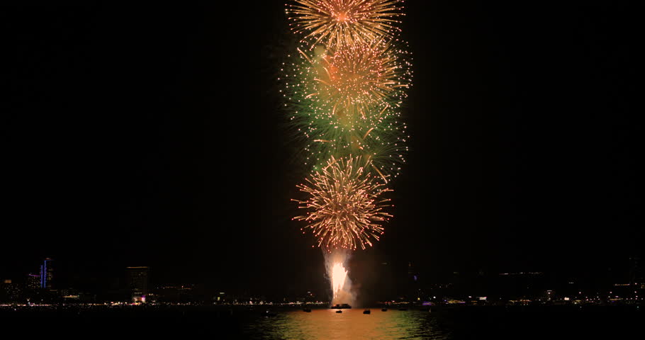 Celebration greeting Beautiful fireworks colorful fireworks on the beach for abstract background , anniversary, celebration , 4th independence day and new year background or wallpaper. | Shutterstock HD Video #1111983569
