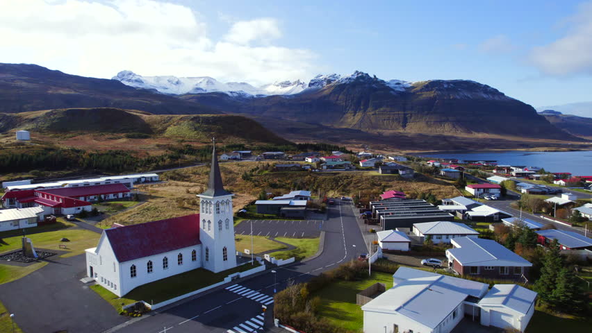 Grundarfjörður picturesque church in a beautiful bay of northwest Iceland. Aerial