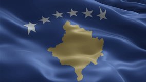 Kosovo flag video waving in wind. Realistic flag background. Close up view, perfect loop, 4K footage