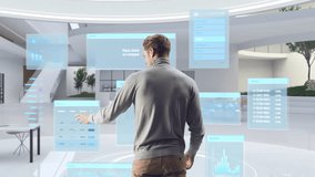 Futuristic Businessman Standing in a Virtual Space, Gesturing with an Augmented Reality Hologram Analysing Big Data, Financial Reports, Stock Market Statistics, Infographics and Charts. Future Concept - Powered by Shutterstock - Get 15% off with code: PIKWIZARD15