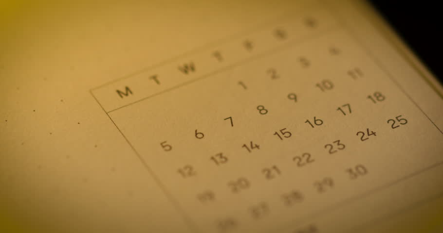 Circling date on calendar with pen - close up | Shutterstock HD Video #1111988287