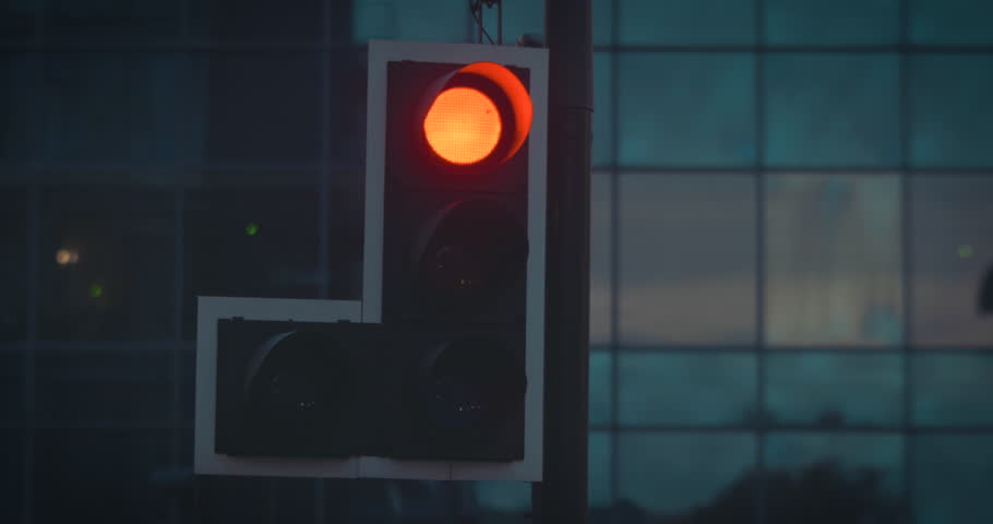 Traffic light turning green in city at night, close up | Shutterstock HD Video #1111988309