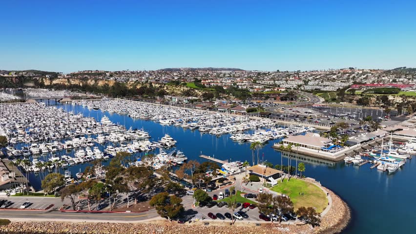 Boats And Yachts Docked At Dana Point Harbor In Orange County, California, USA - Aerial Shot Royalty-Free Stock Footage #1111988699