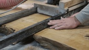 Precision cutting by a woodworker, sawdust scattered around. Demonstrates the timeless value of craftsmanship in the furniture industry. - Powered by Shutterstock - Get 15% off with code: PIKWIZARD15