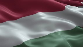 Hungary flag video waving in wind. Realistic flag background. Close up view, perfect loop, 4K footage