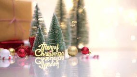 Merry Christmas greetings video clip with copy space, Beautiful Christmas trees with balls and gift boxes on the background, 2023 Merry Christmas 