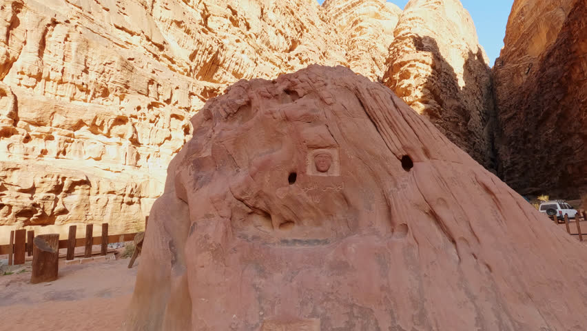 Bas-relief and inscription in honor of Lawrence of Arabia, Wadi Rum, Jordan. Handheld | Shutterstock HD Video #1111993231
