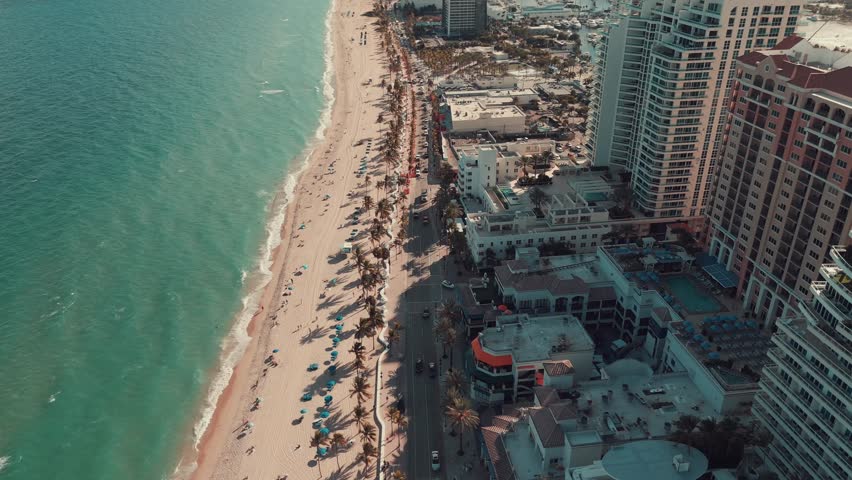 Welcome to Drone Delights, where we take you on breathtaking aerial journeys. Today, we invite you to discover Fort Lauderdale's aerial allure. Royalty-Free Stock Footage #1111993531