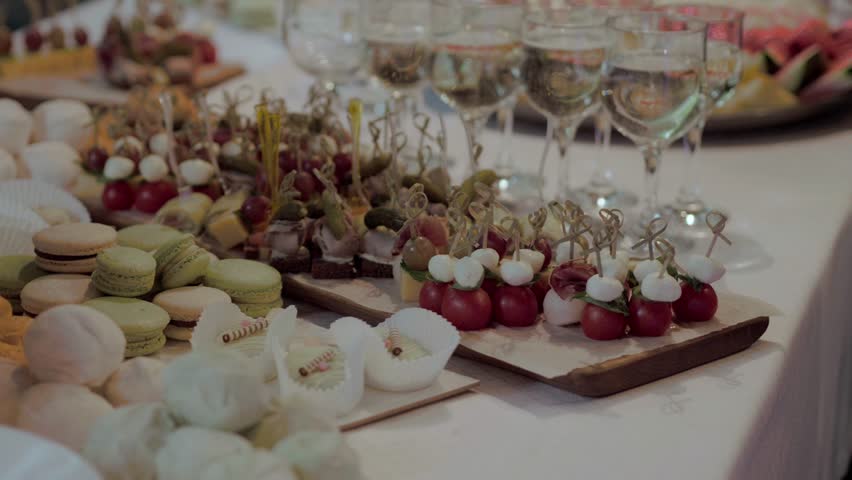 Food at the event canapés and finger food. Catering business buffet table catering at the event corporate birthday celebration for childrens party or wedding. 