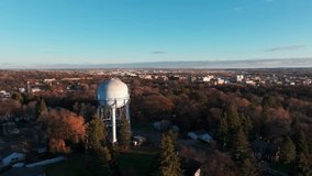 Drone aerial view of a water tower at sunset in Bismarck, North Dakota