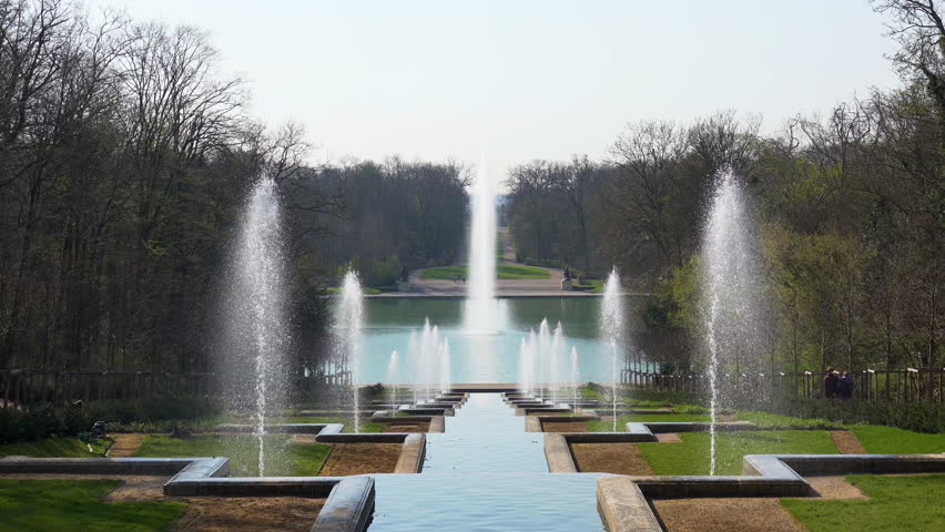 Grande Cascade in public Departemental Parc de Sceaux with Octogone Pool and Fountain in the background. Shot at early morning in March - Hauts-de-Seine, France.