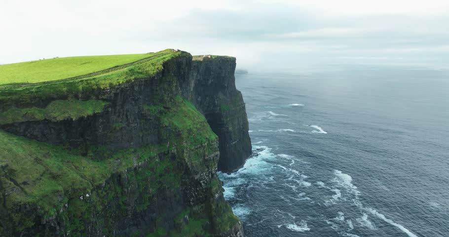 Cliffs of Moher steep precipice, Ireland tourist destination, aerial view 4k Royalty-Free Stock Footage #1112008131