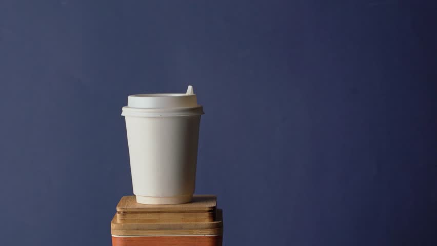 Isolated mockup template of a paper takeaway coffe cup | Shutterstock HD Video #1112008379