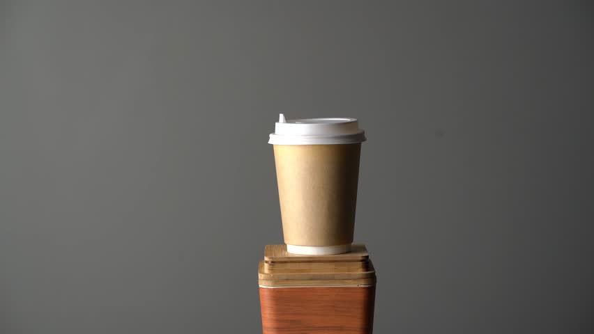 Isolated mockup template of a paper takeaway coffe cup | Shutterstock HD Video #1112008399