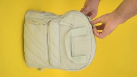 open backpack lock, vertical video
