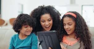 Mother, kids and tablet for home education, e learning and online games on sofa with funny video or movie streaming. Happy interracial family and children on digital technology for website of school